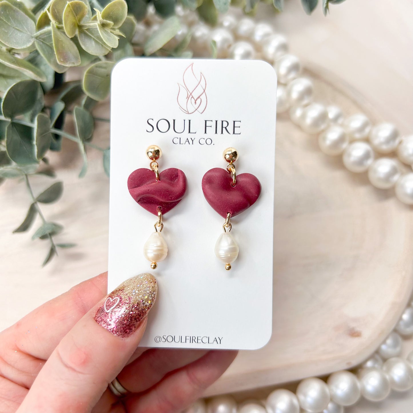 Draped Pearl Hearts Statement Earrings
